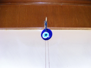 A Greek superstition called Mati where this eye is placed at your door to prevent the envy of others from cursing you